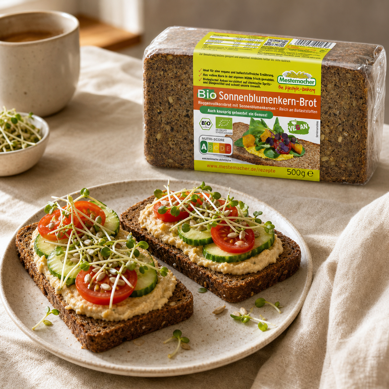 Mestemacher organic sunflower seed rye bread 500g, served, with the pack beside it
