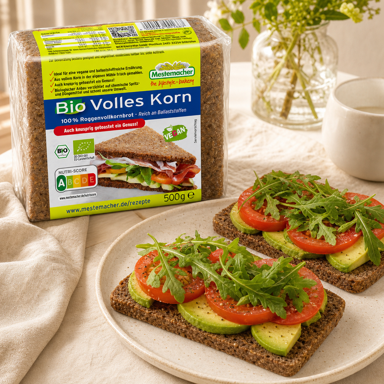 Mestemacher organic wholegrain rye bread 500g, served, with the pack beside it