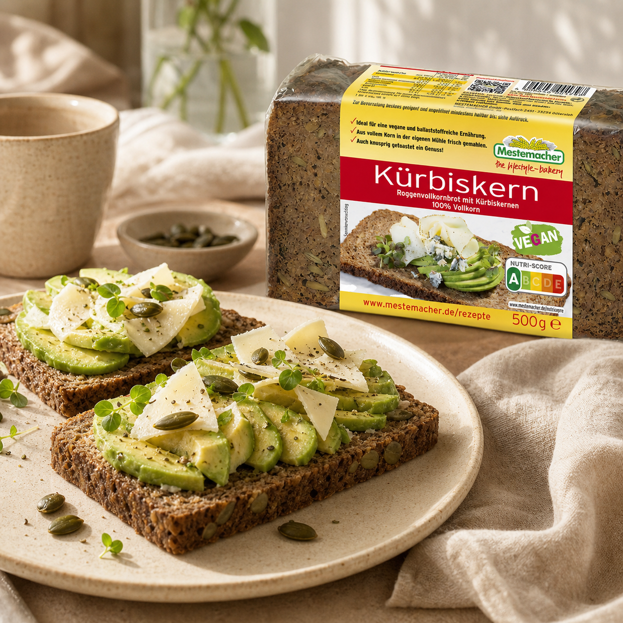 Mestemacher Kuerbiskern German pumpkin seed rye bread 500g, served, with the pack beside it