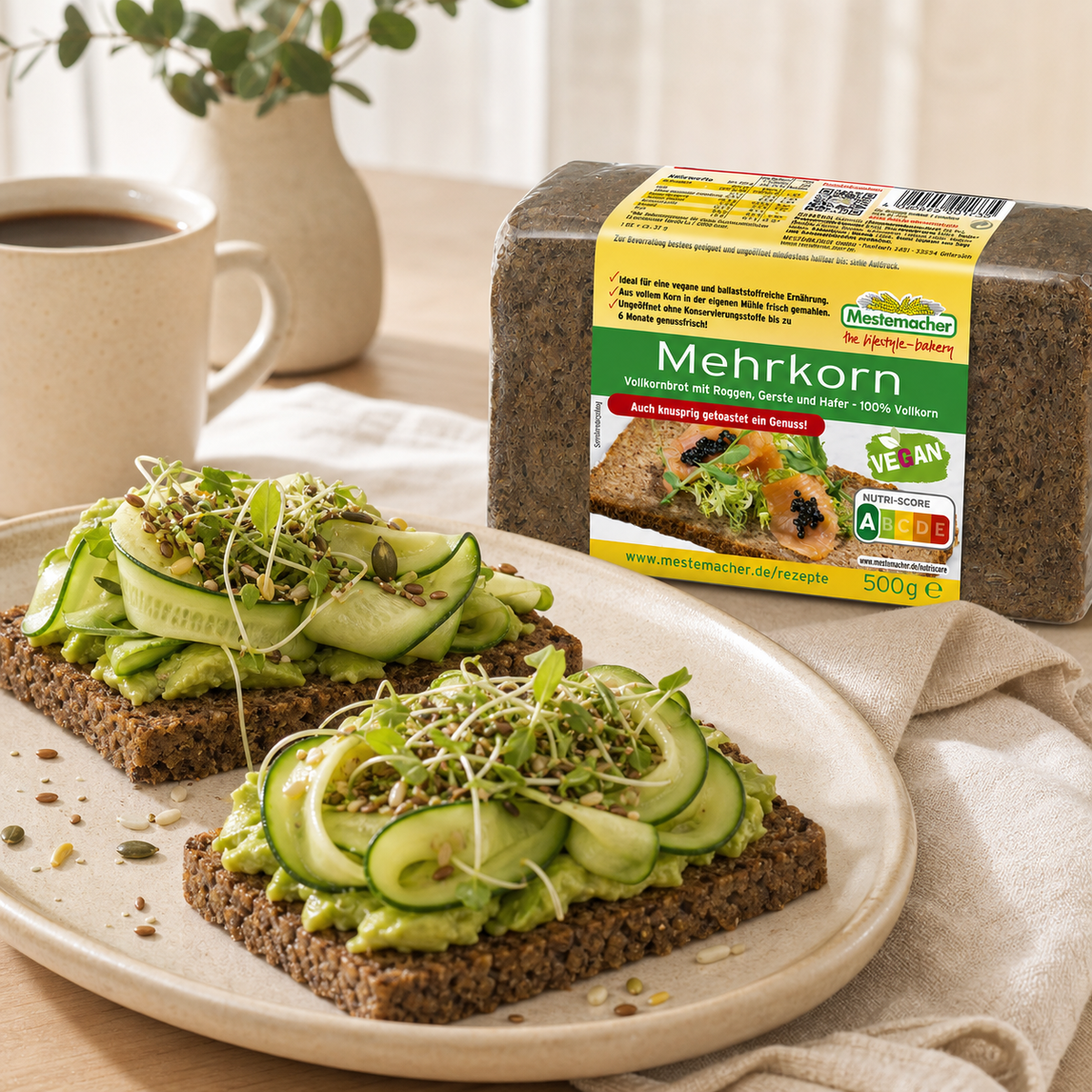 Mestemacher Mehrkorn German multigrain rye bread 500g, served, with the pack beside it